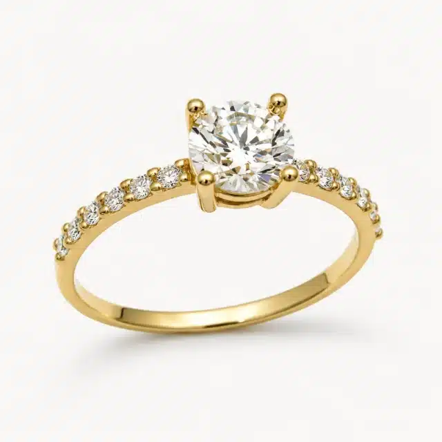Solitario Aura 0,60 ct en oro amarillo con diamante de laboratorio y diamantes laterales