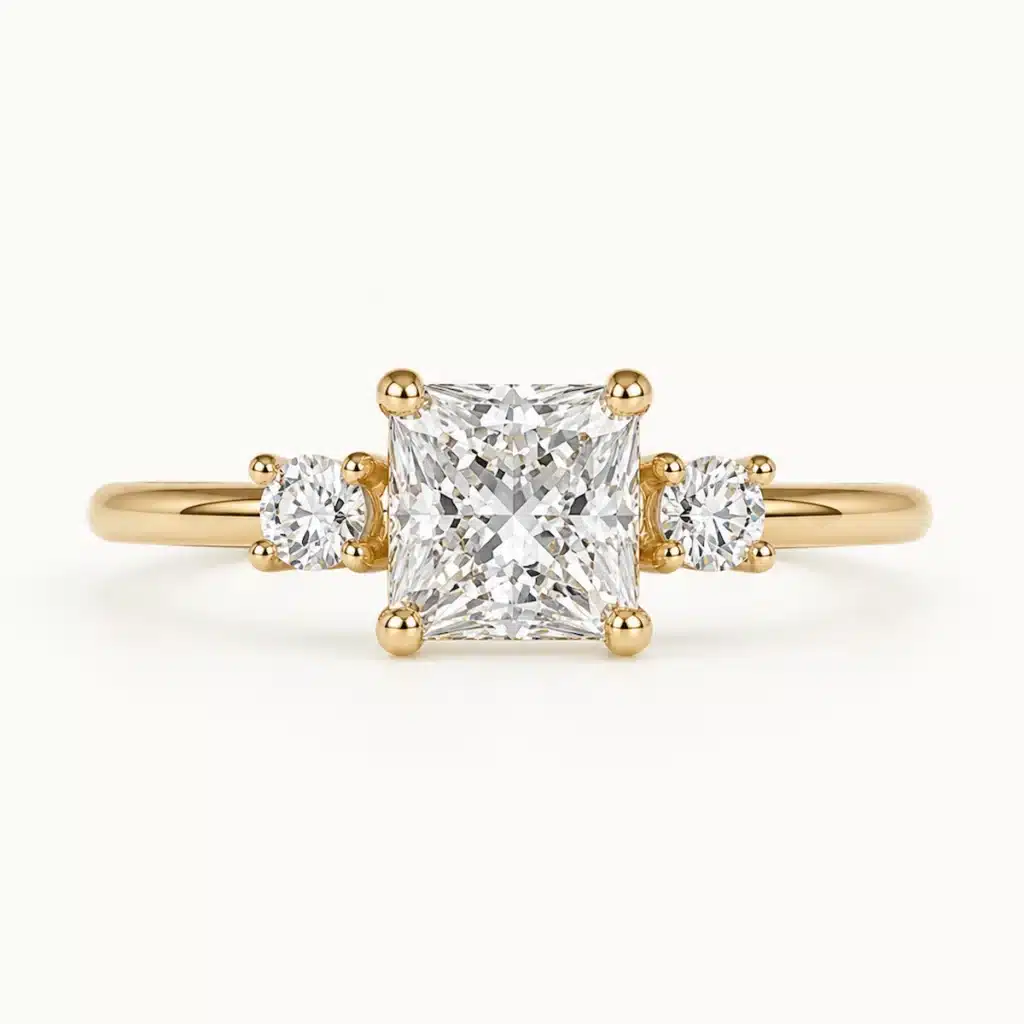 Solitario Vera Radiant 1 ct en oro amarillo con diamante central Square Radiant y diamantes laterales de laboratorio