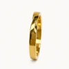 Alianza de boda de oro amarillo con disenu0303o infinito